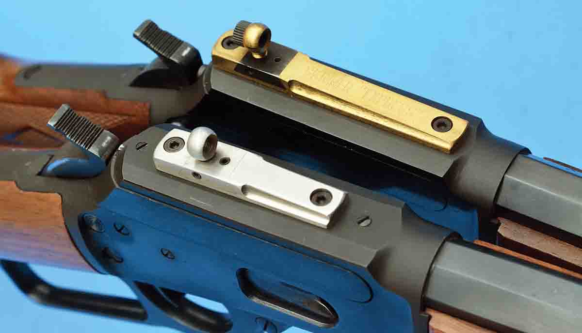 Skinner Sights offer top-notch aperture sights for lever-action rifles and many other firearms. A Skinner Express Peep made of brass (top) and  a Skinner Sights Reliable constructed of stainless steel (bottom) are both shown on Marlin Model 1894 rifles.